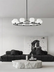 Minimalist black and copper glass chandelier with frosted globe lights for dining room decorbites copper glass design