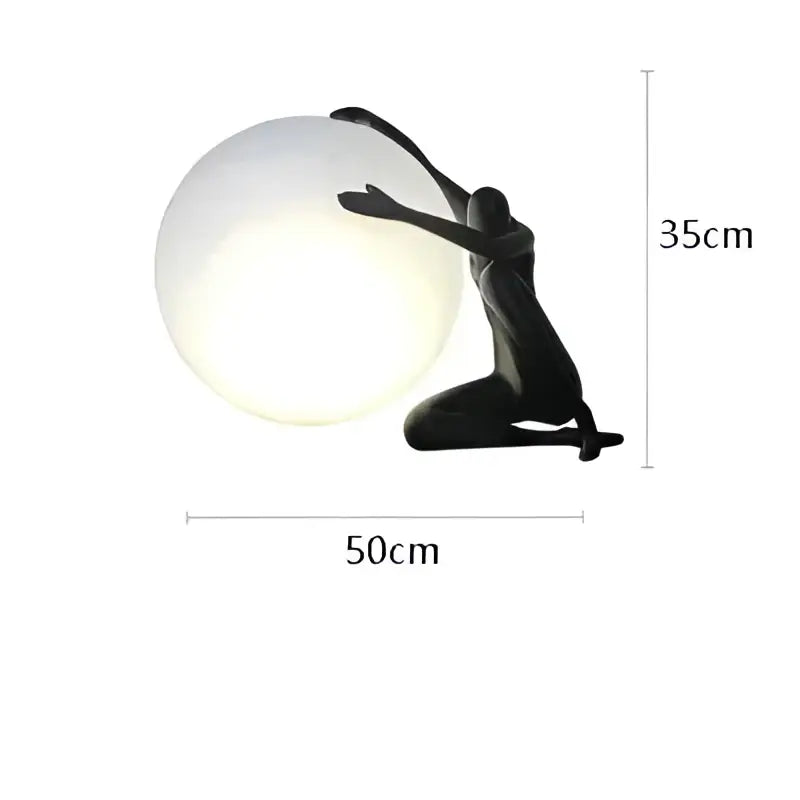Minimalist black and white decorbites humanoid sculpture led table lamp with glowing spherical globe for bedroom decor