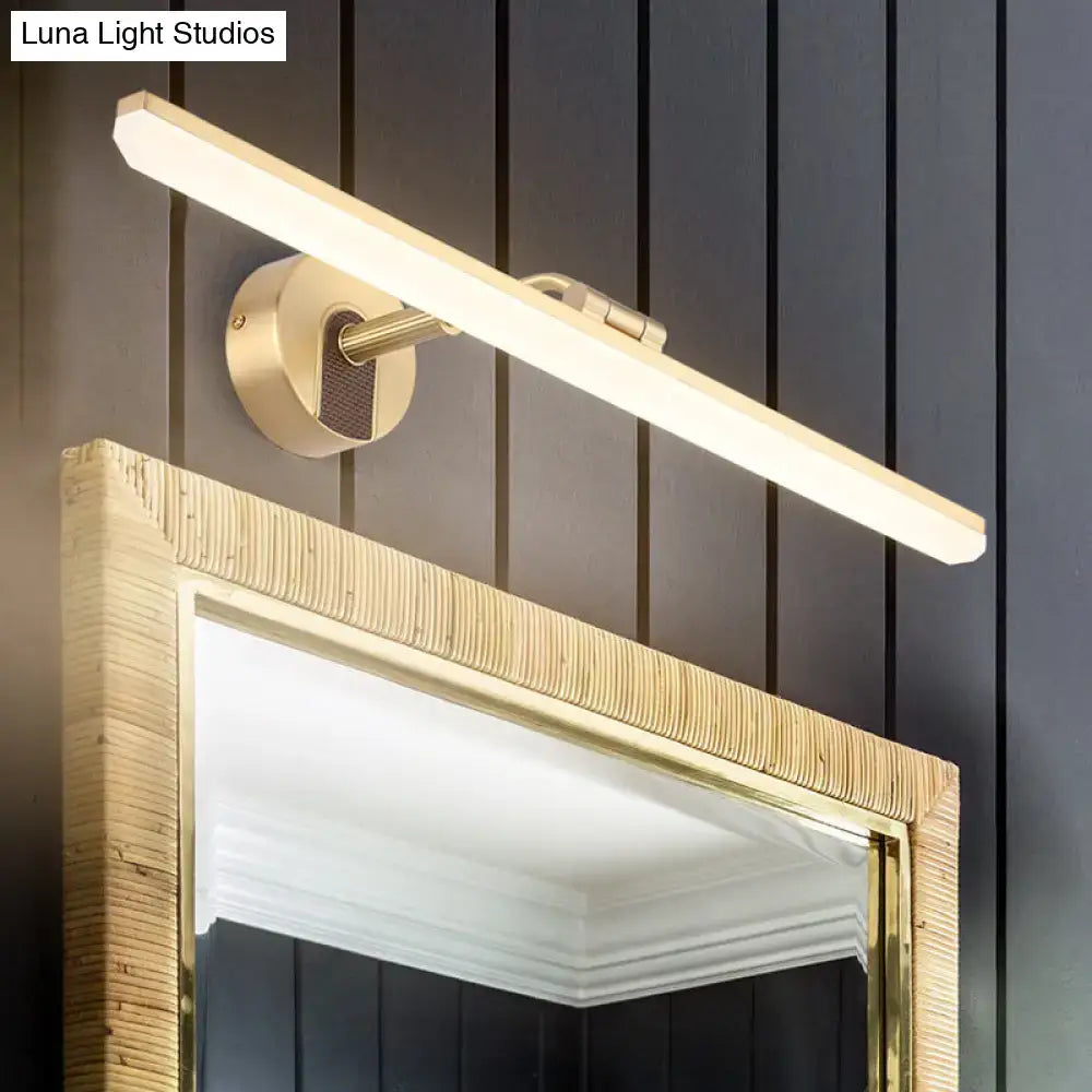Gold-toned rectangular led wall sconce with matte finish as a wall mounted vanity light for modern bathrooms