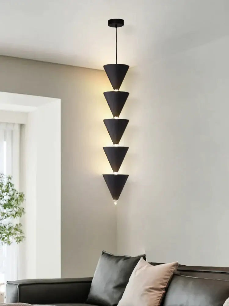 Minimalist black conical pendant light with five stacked geometric shades for decorbites cream bedroom chandelier lighting