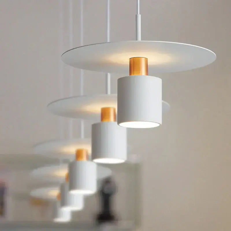 Minimalist black and copper decorbites iron art led chandelier with modern white pendant lights and gold accents cylindrical design