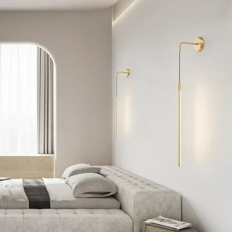 Gold-toned minimalist copper wall lamp with slender arms and sleek modern design for bedroom decorbites copper wall lamp