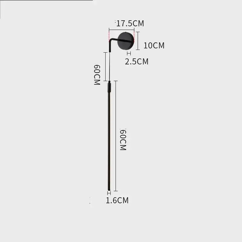 Minimalist black copper wall lamp with a sleek circular light and black matte-finished slender stem for bedroom decorbites copper wall lamp