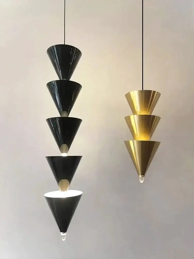 Minimalist black and cream bedroom chandelier with stacked conical light design for decorbites cream bedroom decor