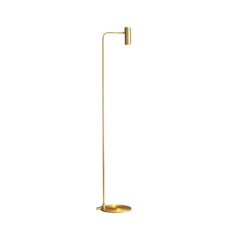 Minimalist black decorbites brass floor lamp with gold finish, slender curved arm, and cylindrical head for bedroom lighting