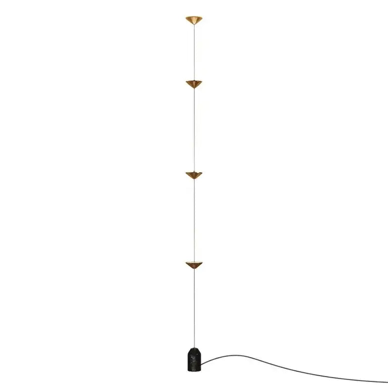 Minimalist black decorbites cone design floor lamp with four brass triangular shades and black marble base for living room