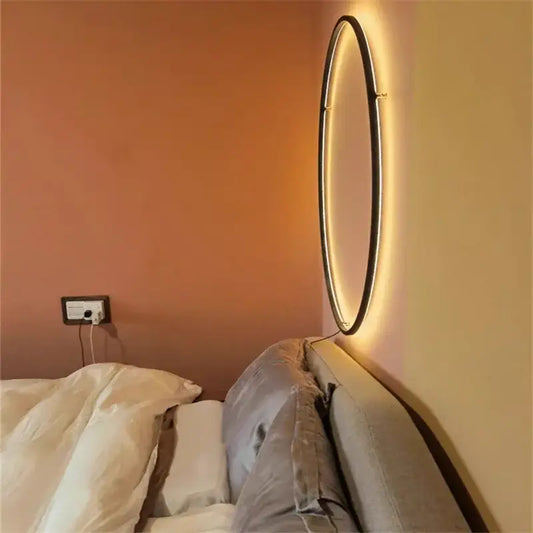 Minimalist black designer ring led wall light with sleek frame and warm glowing illumination for living room decorbites wall light