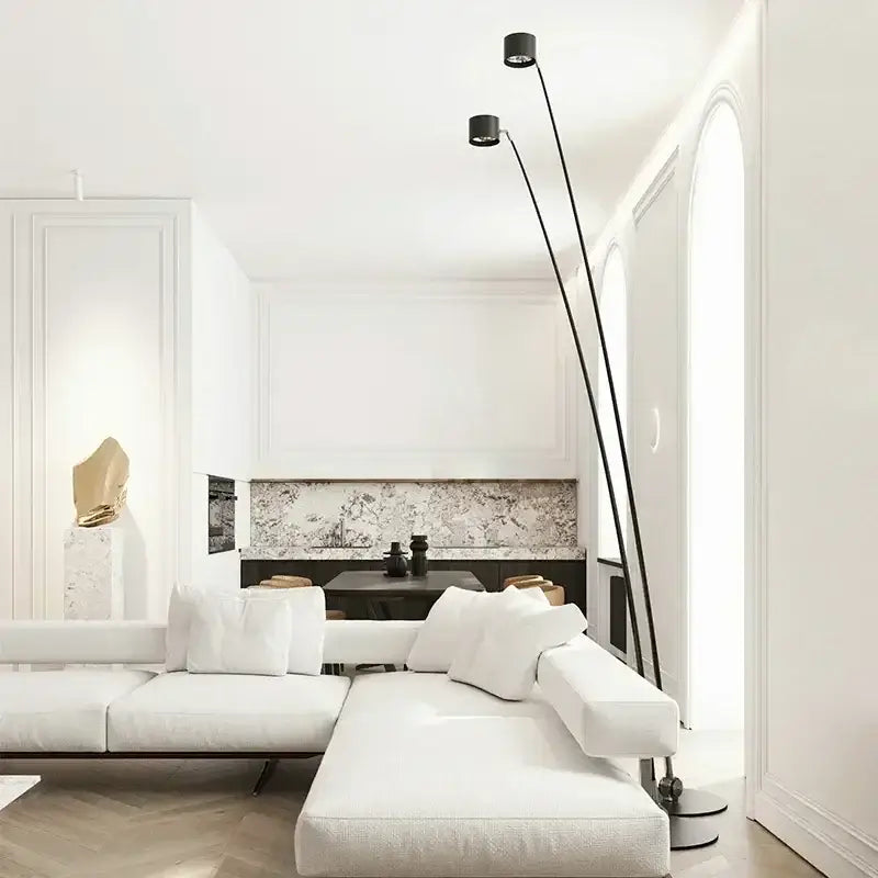 Minimalist black floor lamp with slender curved led arms and two adjustable spotlights for modern living room decorbites black floor lamp
