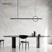 Minimalist black geometric copper chandelier with sleek horizontal bar and circular accent for dining room decorbites geometric copper