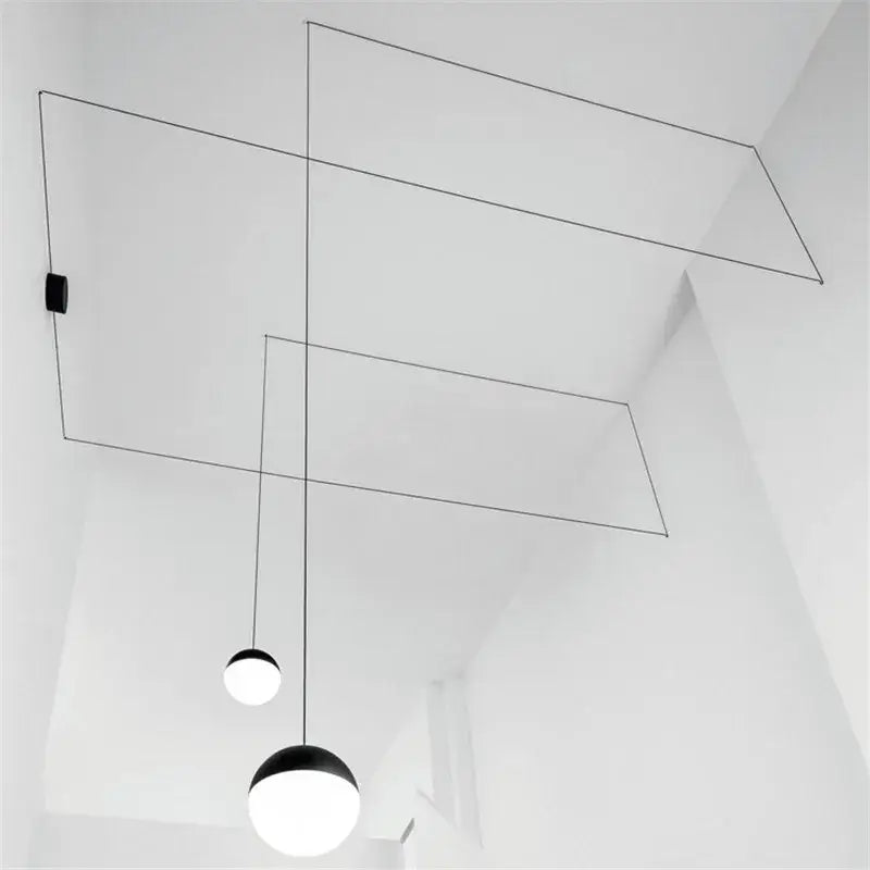 Minimalist black geometric glass ball led chandelier with wireframe and spherical glass shades for living room decorbites geometric glass