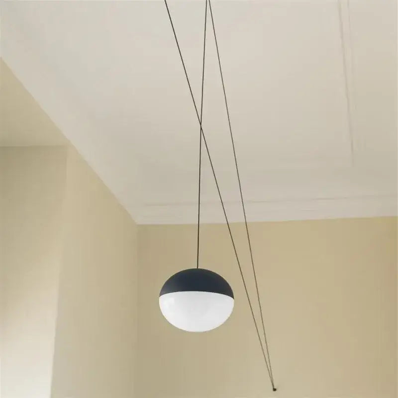 Minimalist black geometric glass ball led chandelier with a sleek matte black and translucent white decorbites geometric glass pendant light