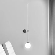 Minimalist black glass ball led wall light with slender vertical rod and frosted glass bulb for living room decorbites wall lights