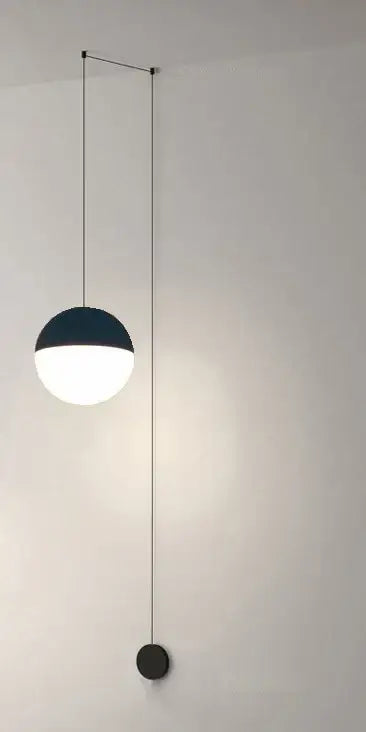 Minimalist black glass ball pendant light with two-toned matte black and frosted white decorbites glass ball design
