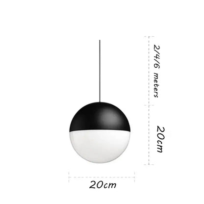 Minimalist black glass ball pendant light with a sleek black and white spherical design for modern kitchen decorbites glass ball pendant