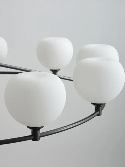 Minimalist black metal glass lampshade chandelier with frosted white globes for dining room decorbites glass lampshade