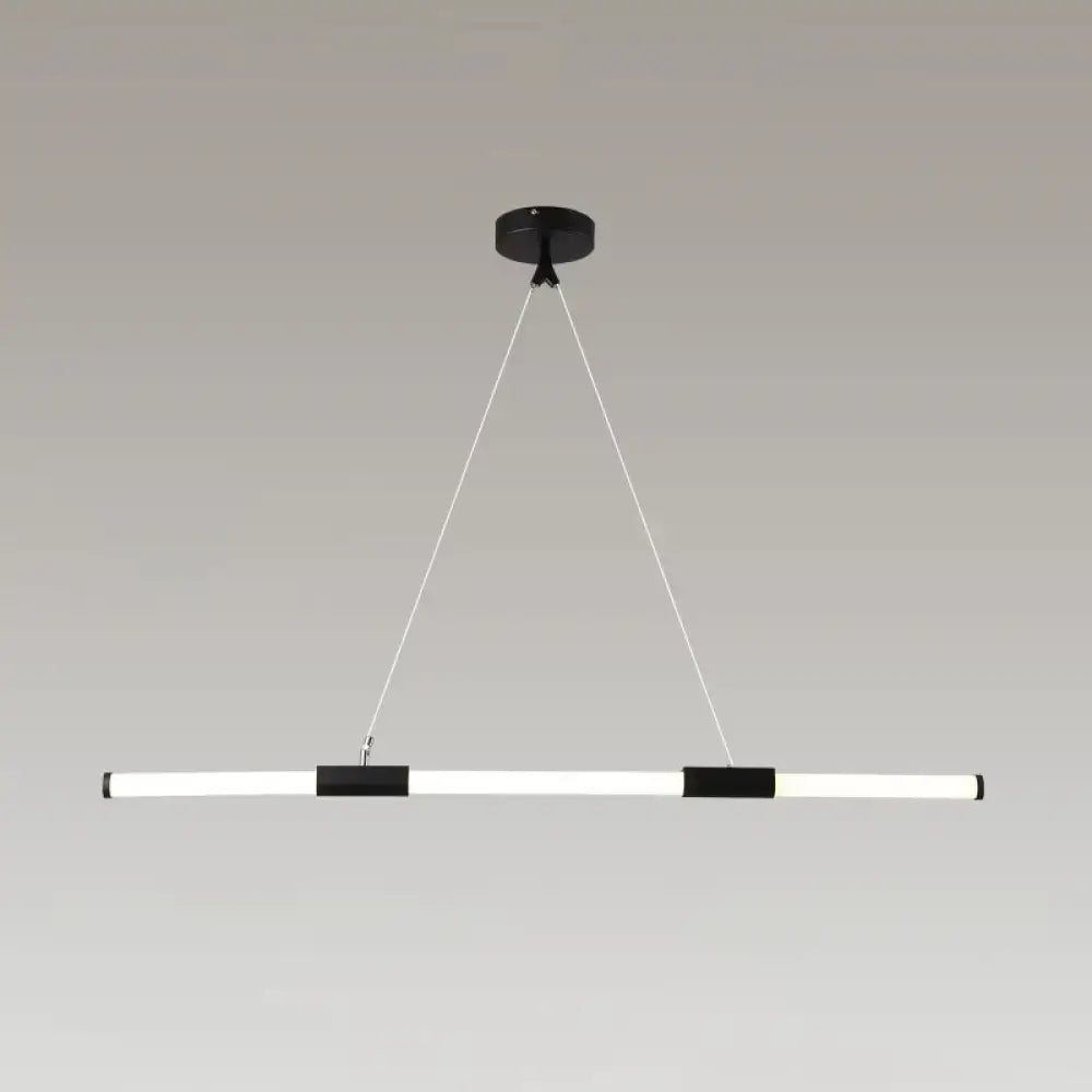 Modern black and white minimalist glass tube pendant lamp with frosted white shade for office lighting by DecorBites