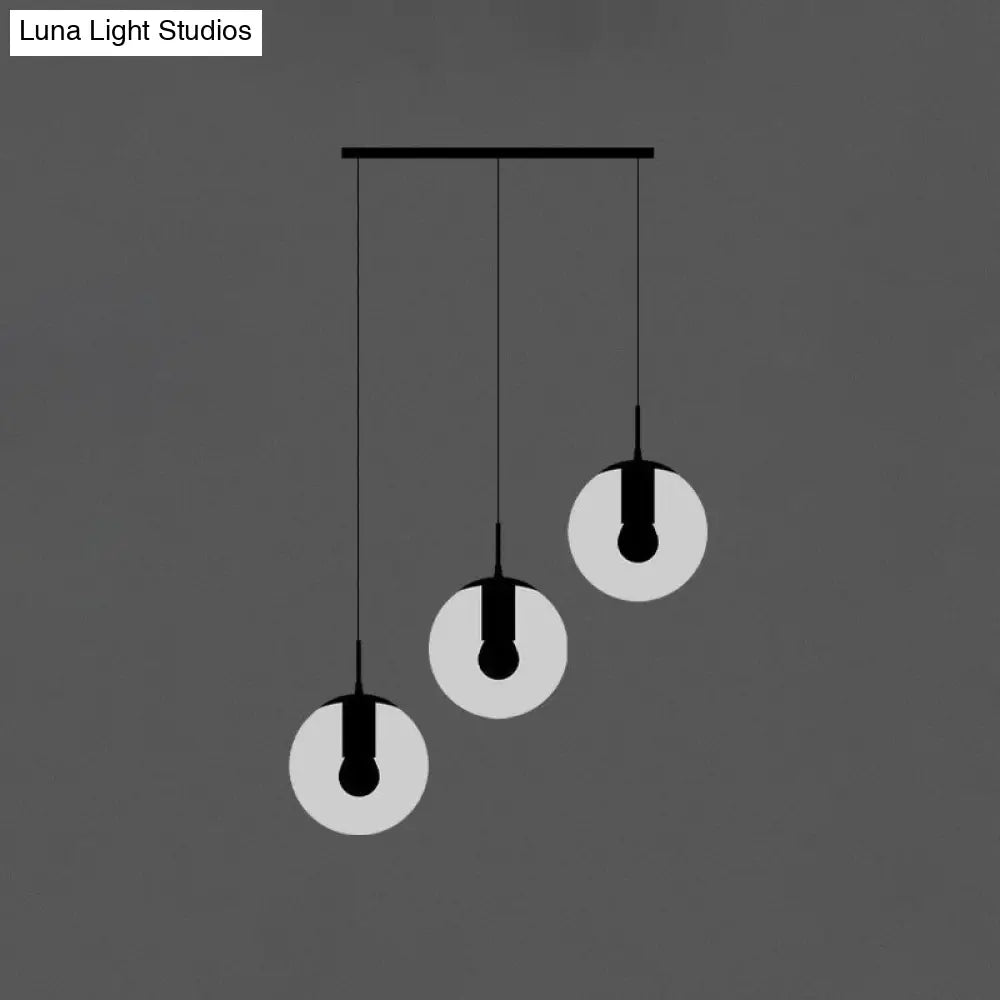 Minimalist Black Globe Pendant Light with Cream Glass - Ideal for Stairways