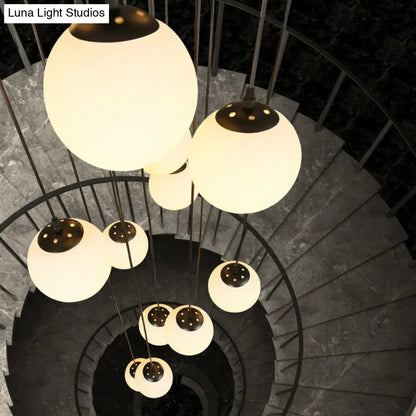 Minimalist Black Globe Pendant Light with Cream Glass - Ideal for Stairways