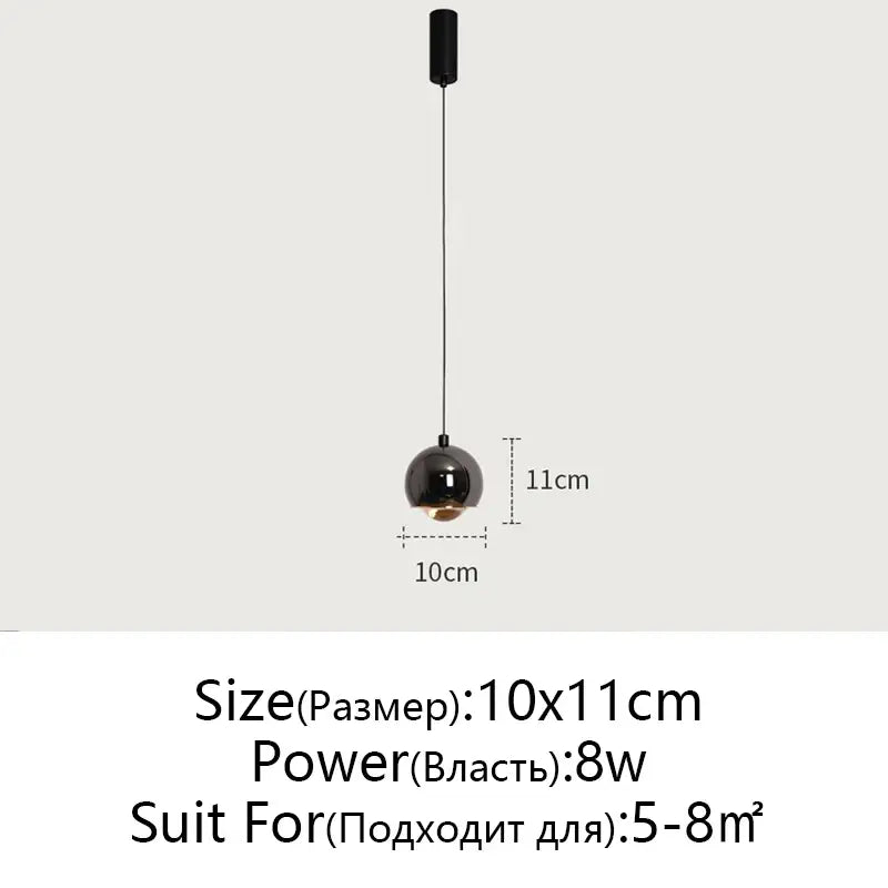 Minimalist black spherical pendant light with glossy decorbites gold metal luster and 8w bulb for bedroom and kitchen island