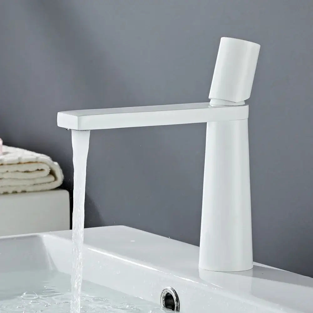 Modern white ceramic bathroom faucet mixer with sleek minimalist design and tall cylindrical base for decorbites brass bathroom