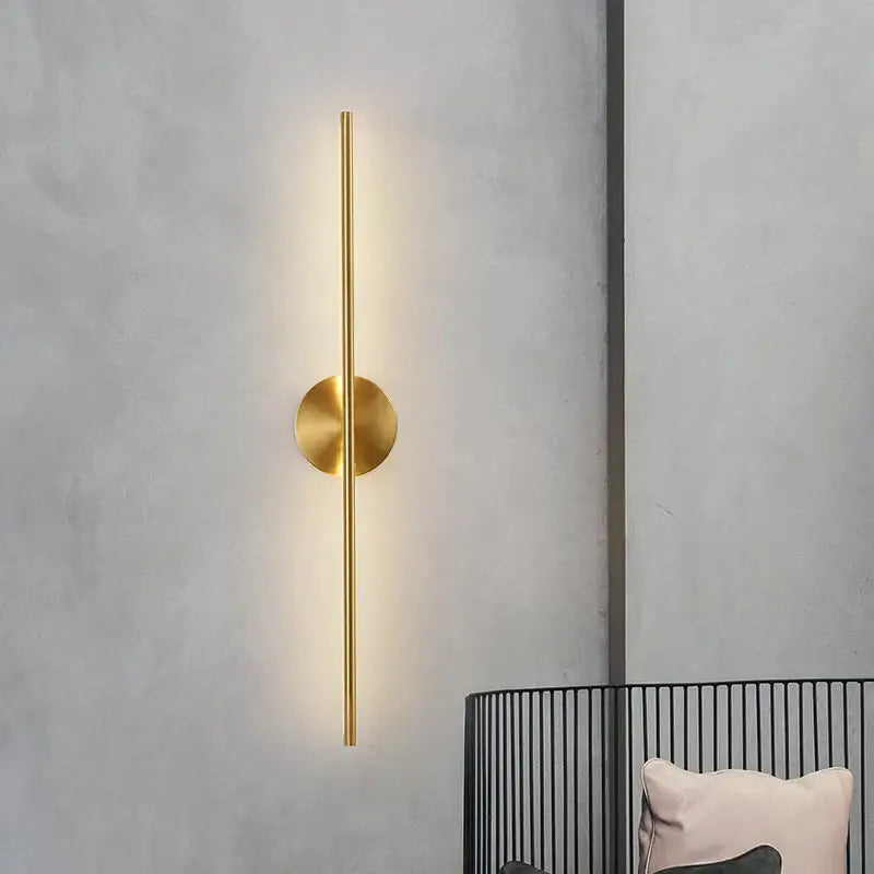 Minimalist black and gold copper wall sconce lamps with a gold-toned copper wall sconce emitting warm light for bathroom decorbites copper wall