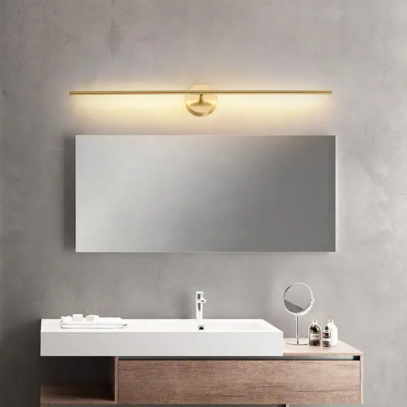 Minimalist black and gold copper wall sconce lamp with a sleek horizontal bar and circular accent for bathroom decorbites copper wall use
