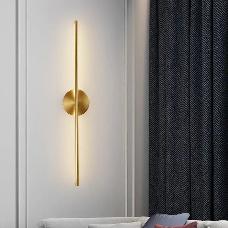 Minimalist black and gold copper wall sconce lamp with sleek vertical rod and warm light for bathroom decorbites copper wall use