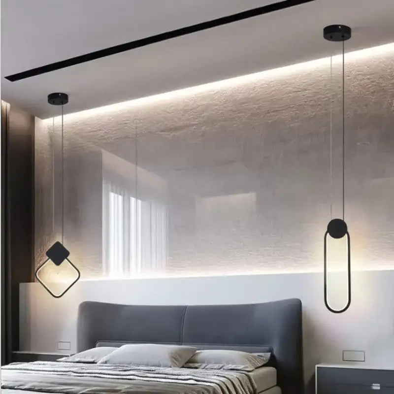 Modern black and gold decorbites crystal led pendant lights with minimalist geometric design hang above the bed