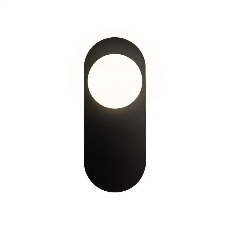 Minimalist black oval wall sconce with gold glass ball led softly glowing for bedroom decorbites glass ball lighting