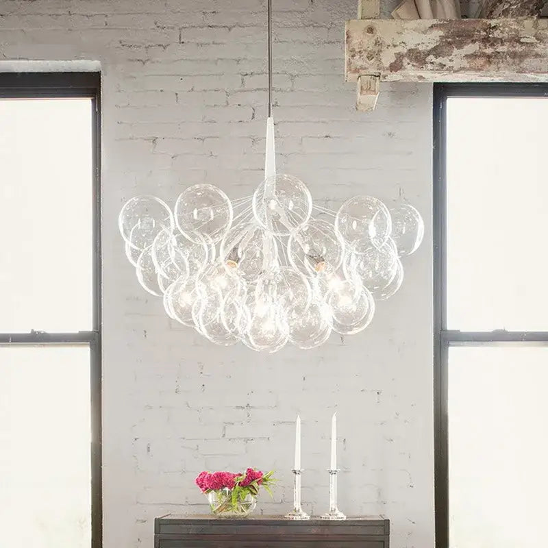 Clear glass bubble chandelier with sleek white rod for minimalist black and gold glass balls ceiling pendant lights decorbites