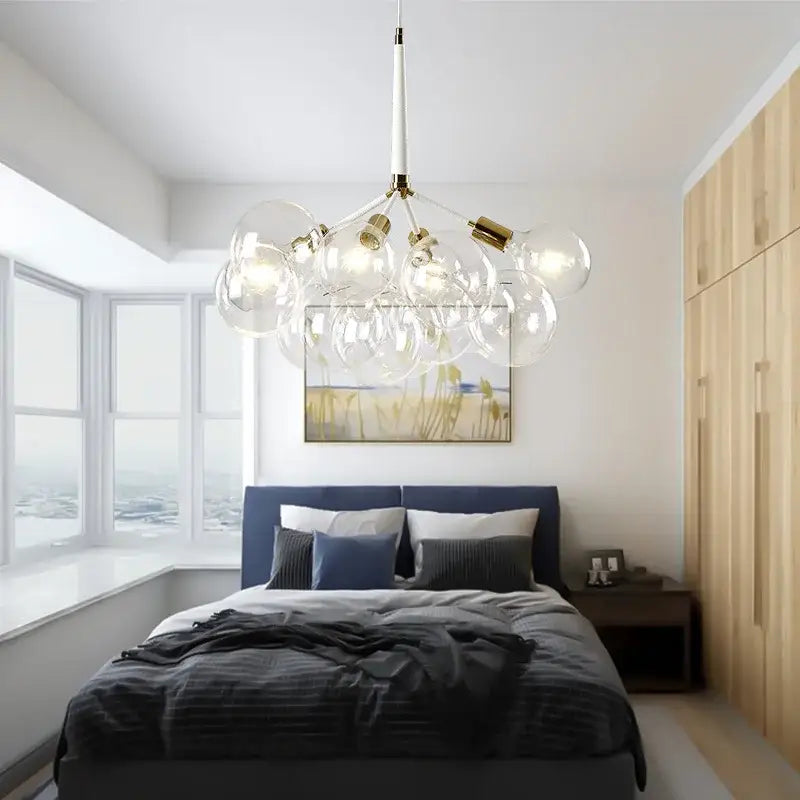 Modern black and gold pendant lights with brass accents featuring decorbites glass balls ceiling fixture above bed