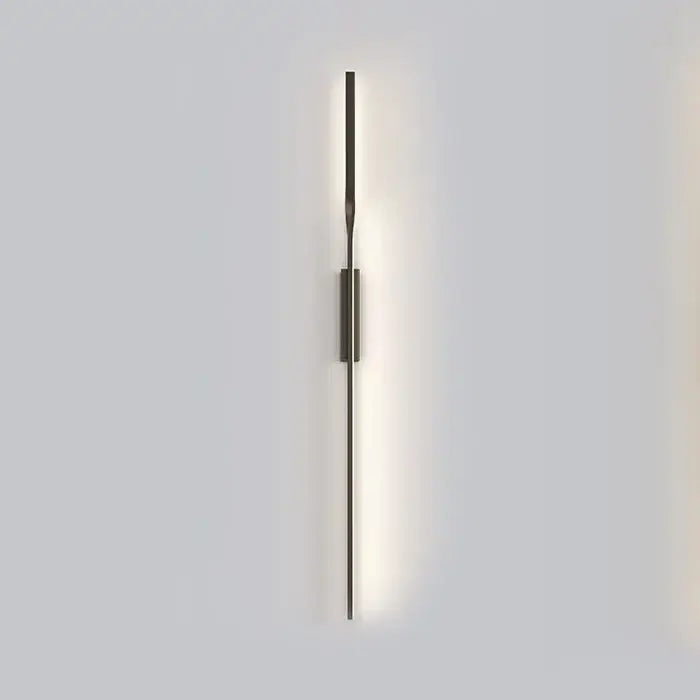 Minimalist black and gold decorbites led wall sconce with slender metallic rod and cylindrical accent for living room or bedroom