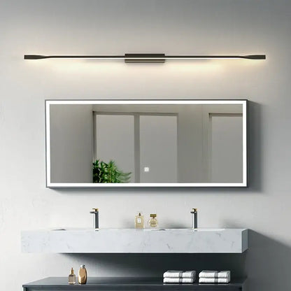 Modern rectangular mirror with slim white frame and integrated led lighting complementing decorbites led wall sconce