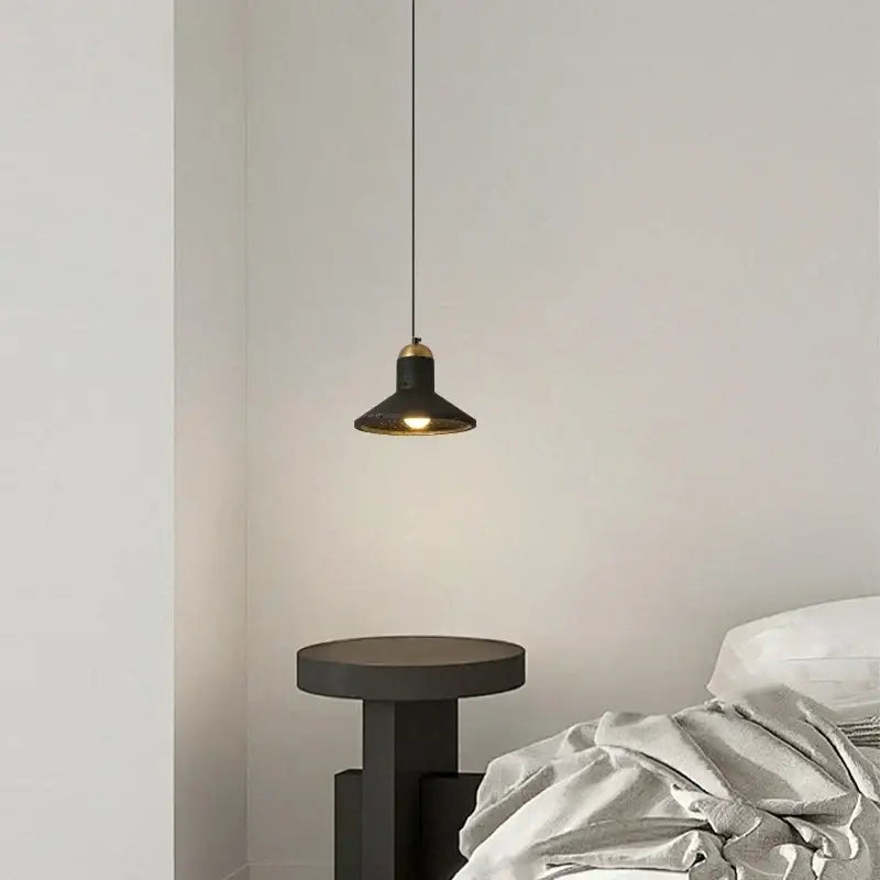 Minimalist black travertine led pendant light with brass accent and warm diffused light for dining room decorbites black travertine