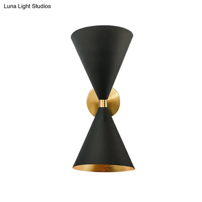 Minimalist black and gold wall lamp with two double cone-shaped shades and sleek modern design for bedroom use