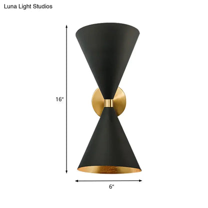 Minimalist black and gold wall lamp with two double cone-shaped matte finish shades and brass accent for bedroom use