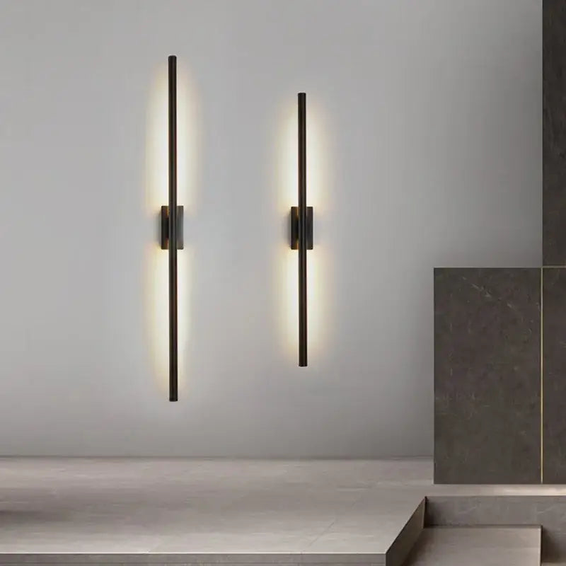Two minimalist black nordic led wall sconces with matte finish emit warm light for elegant decorbites black nordic decor