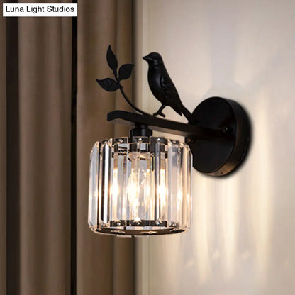 DecorBites™ DecorBites™ Minimalist Black/Gold Wall Sconce with K9 Crystal Cylinder and Bird Detail - 1 Bulb Wall Light