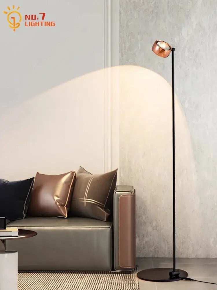 Copper-finished adjustable floor lamp with sleek black stand and circular base featuring decorbites induction dimming