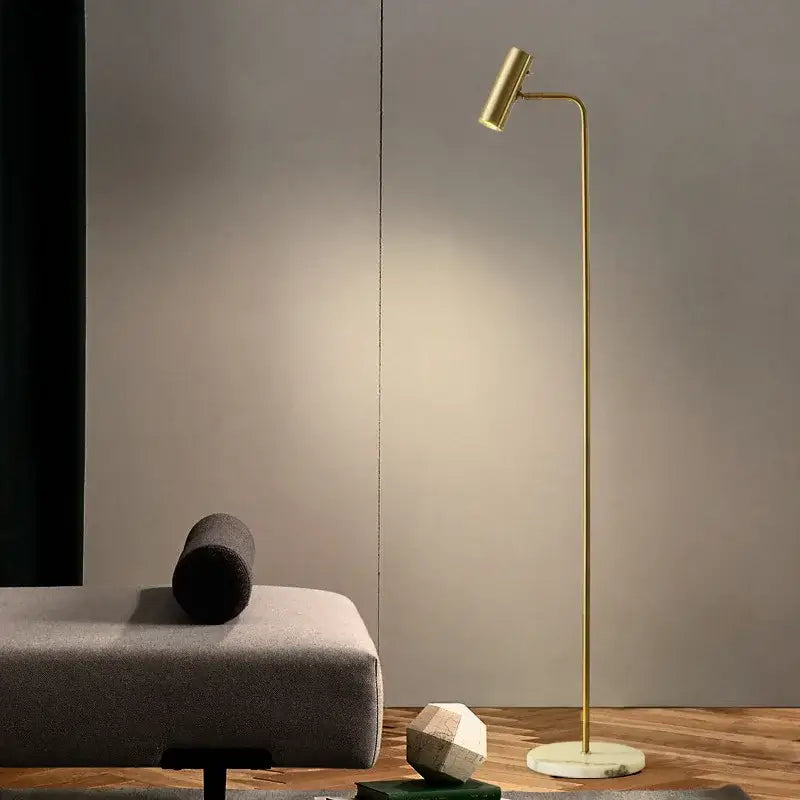 Gold-finished minimalist black enna led dimmable floor lamp with slender curved stem and marble base for living room