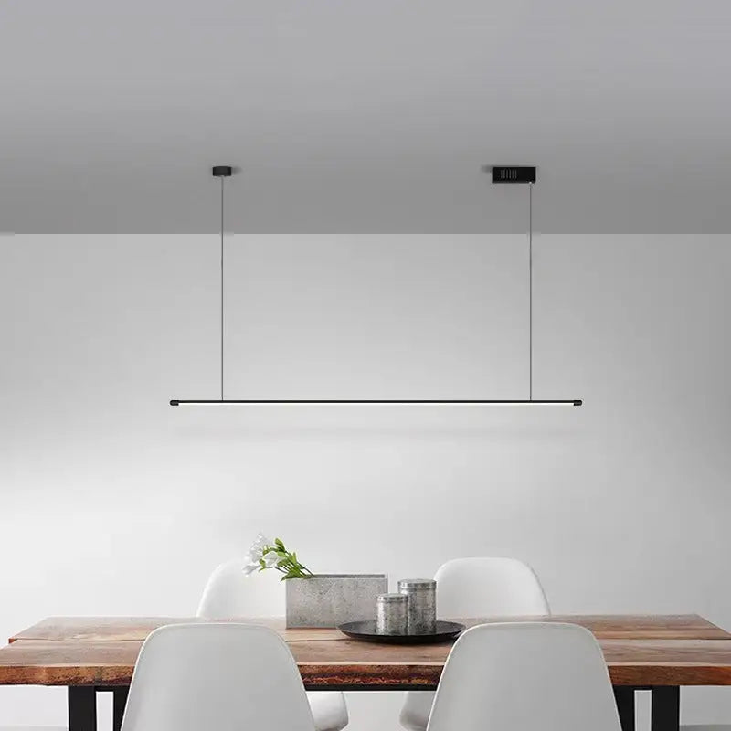 Minimalist black led pendant lamp with sleek linear design hanging above wooden dining table 220v-240v pendant lamp