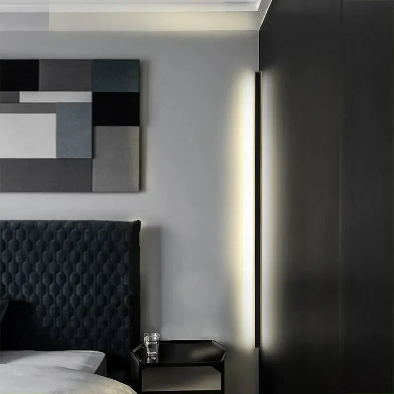 Minimalist black linear led wall lamp with slim frame and warm white illumination for bedroom and living room