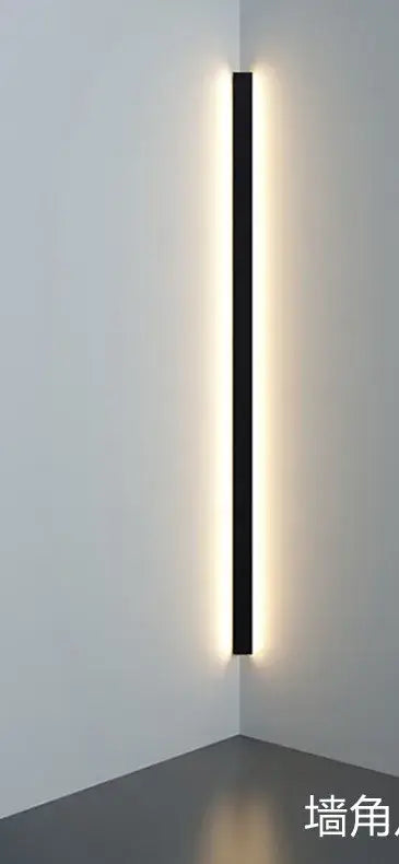 Minimalist black led wall lamp with sleek linear design emitting warm ambient illumination for bedroom and living room