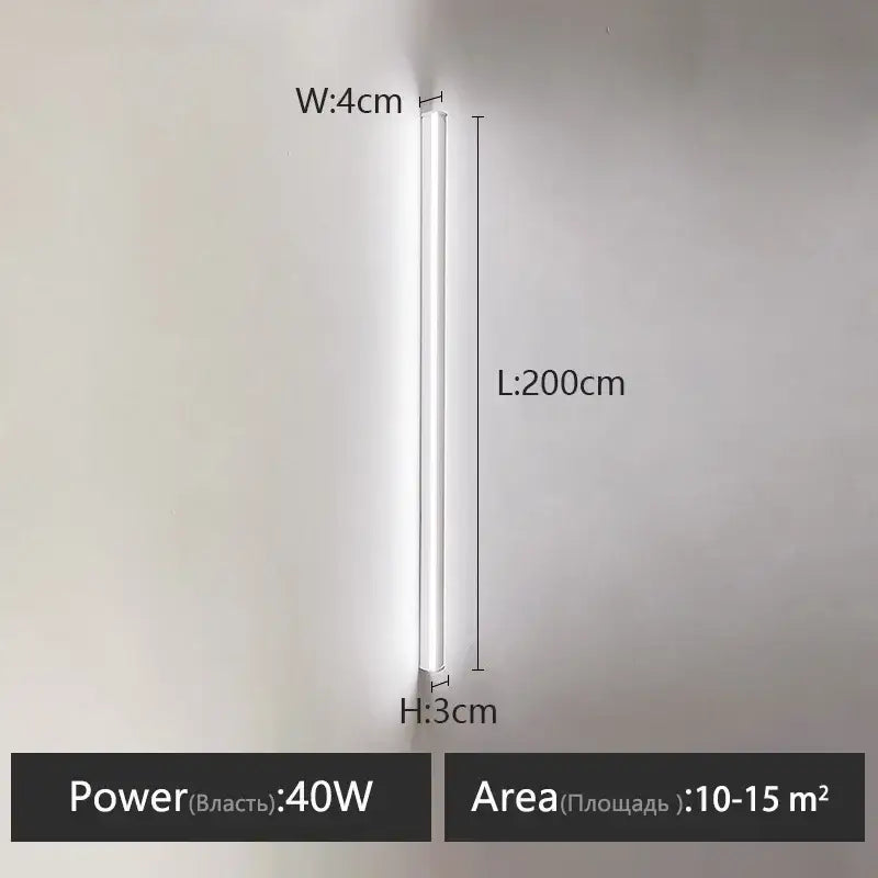A sleek modern 40w white cylindrical wall lamp 200cm by 4cm providing warm glow for bedroom wall use