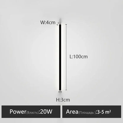 A minimalist black linear led wall lamp with sleek slim profile providing warm glow for bedroom wall lamp use