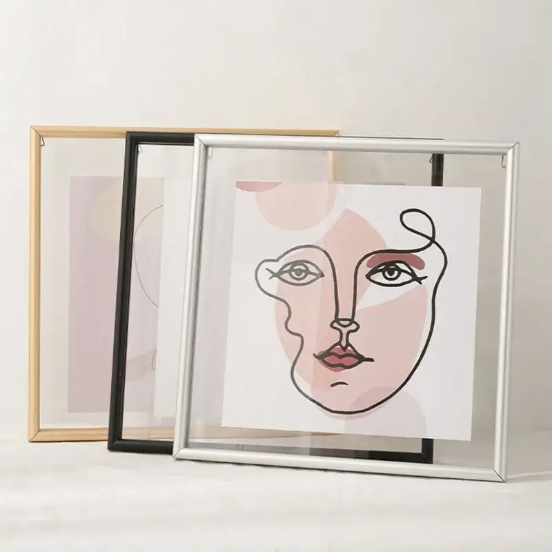 Silver metallic hangable picture frame with minimalist black mademoiselle line-art and pink red accents for bedroom art