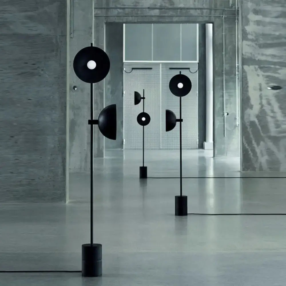 Black circular DecorBites™ Marble LED floor light with funnel shade and matte finish for modern living rooms 220v-240v