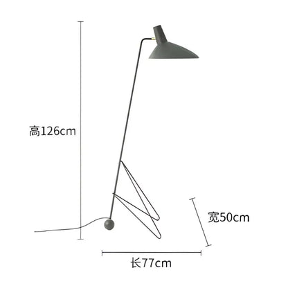 Minimalist black metal tripod desk lamp with a gray conical shade and slender frame for bedroom or office use