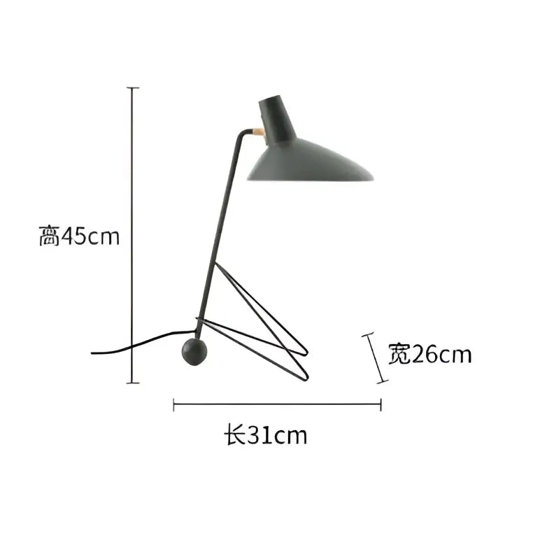 Minimalist black metal tripod desk lamp with sleek design ideal for bedroom or office lighting needs
