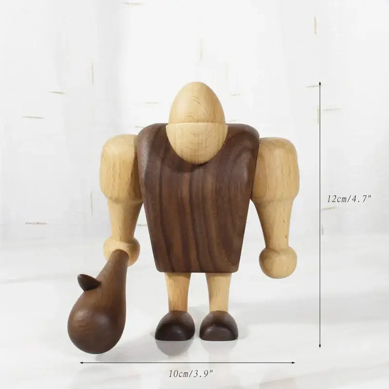A minimalist wood carving figurine with light body and dark brown vest holding a matching jug for living room decor